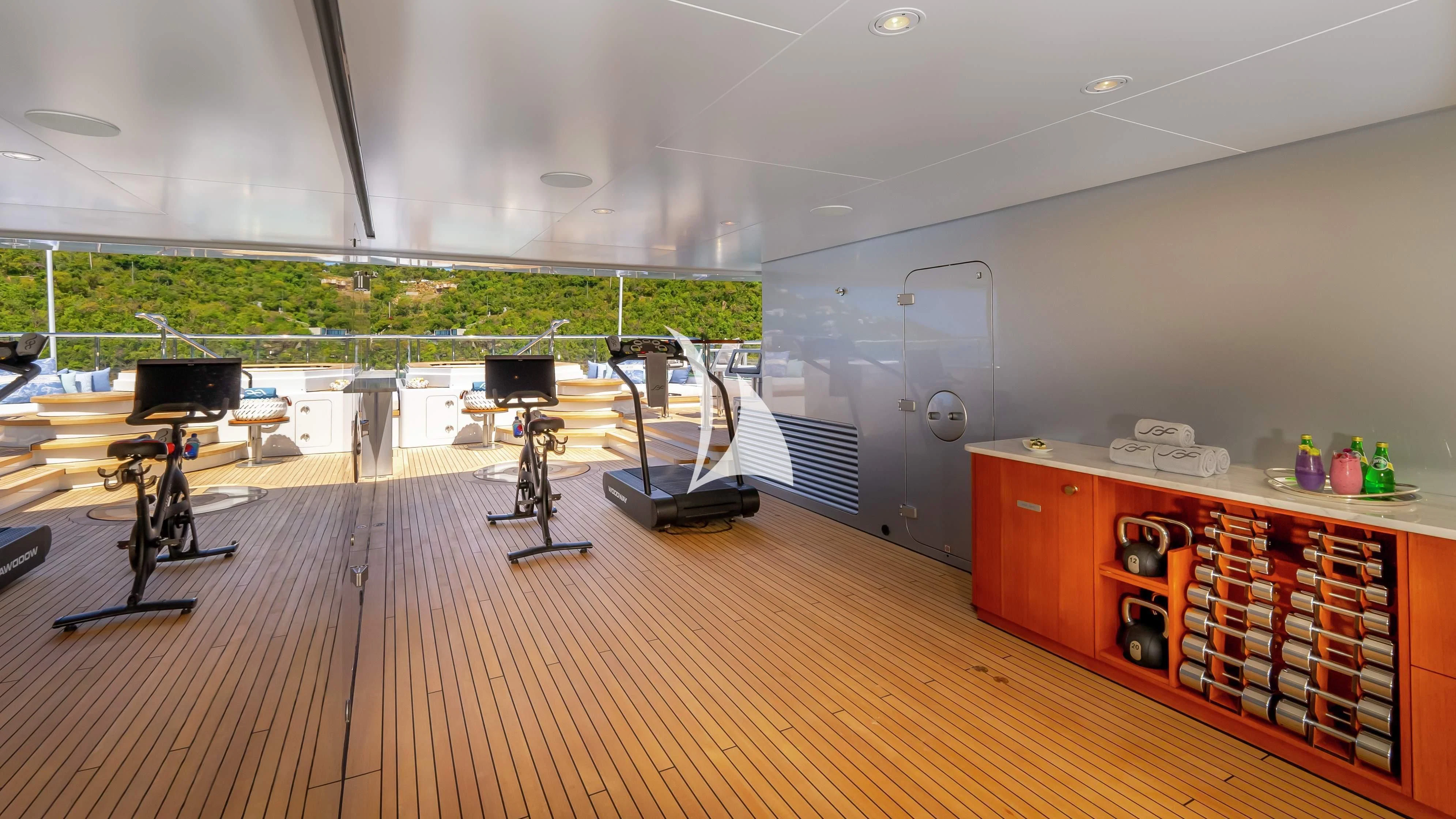 a room with a table and chairs aboard SCOTT FREE Yacht for Charter