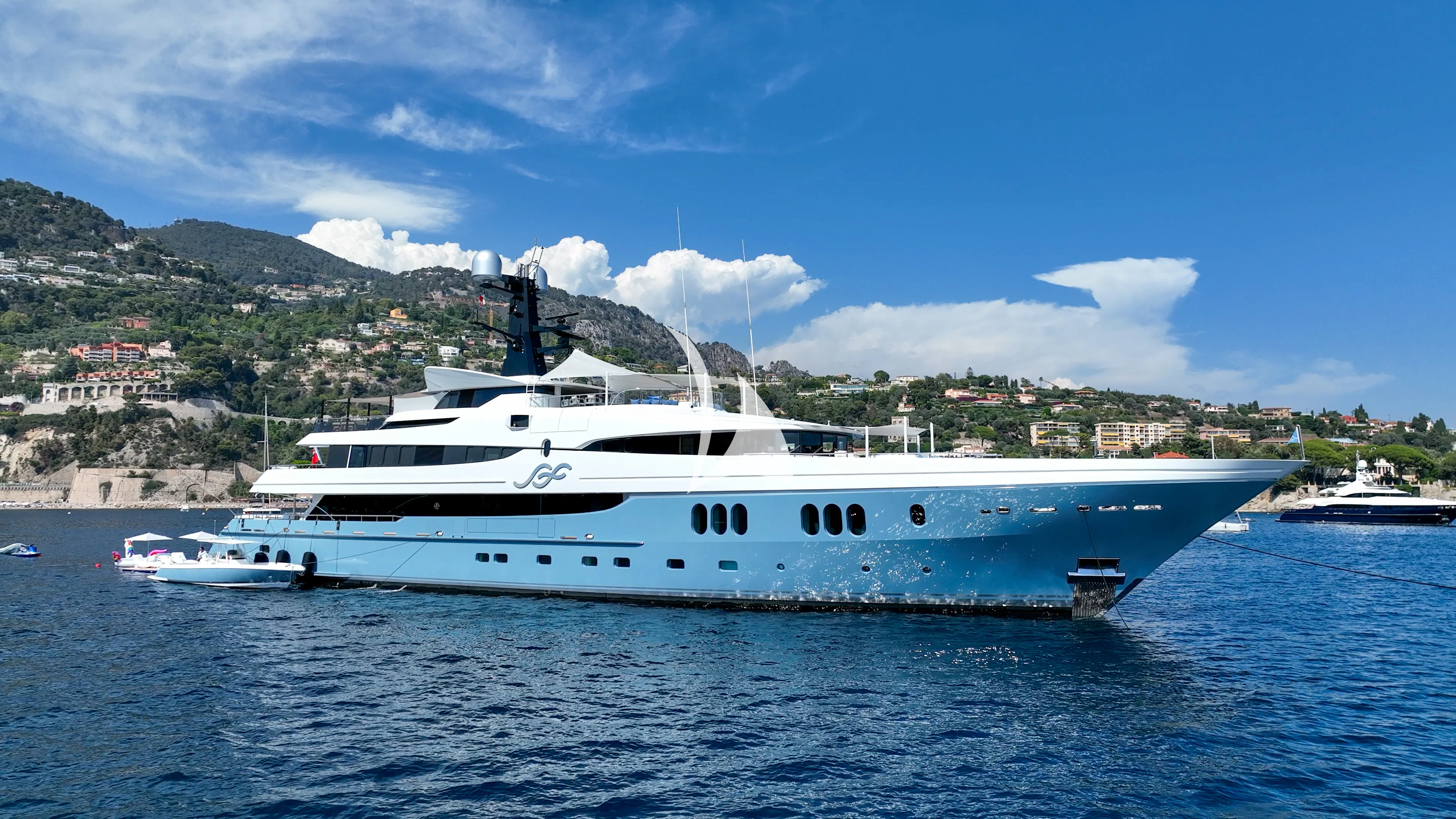 a large white boat in the water aboard SCOTT FREE Yacht for Charter
