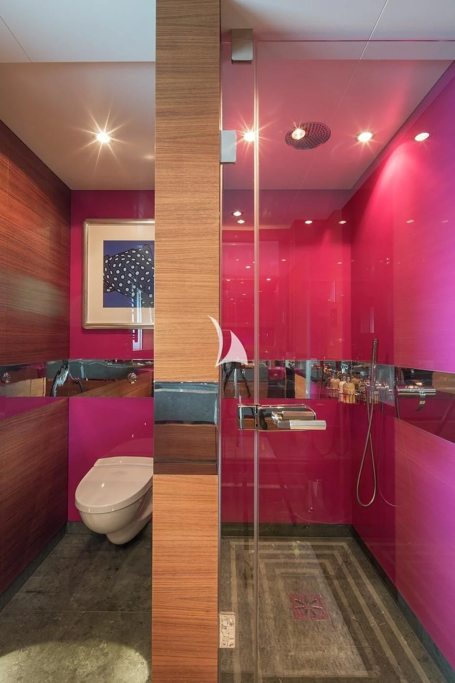 a bathroom with pink walls aboard SCOTT FREE Yacht for Charter