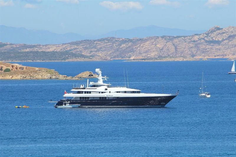a large ship in the water aboard SCOTT FREE Yacht for Charter