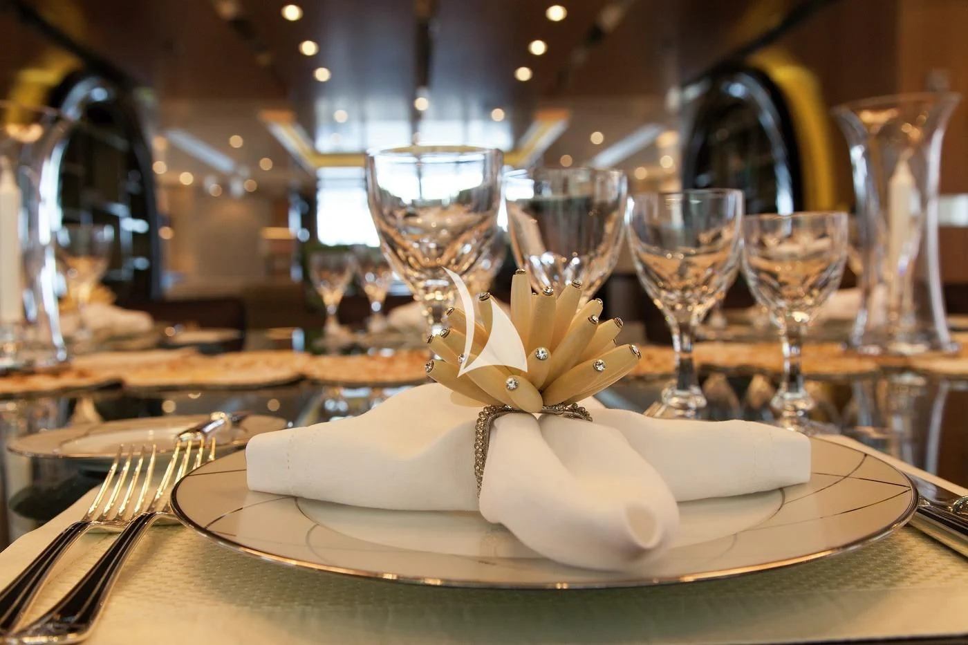 a fancy dinner table aboard SCOTT FREE Yacht for Charter