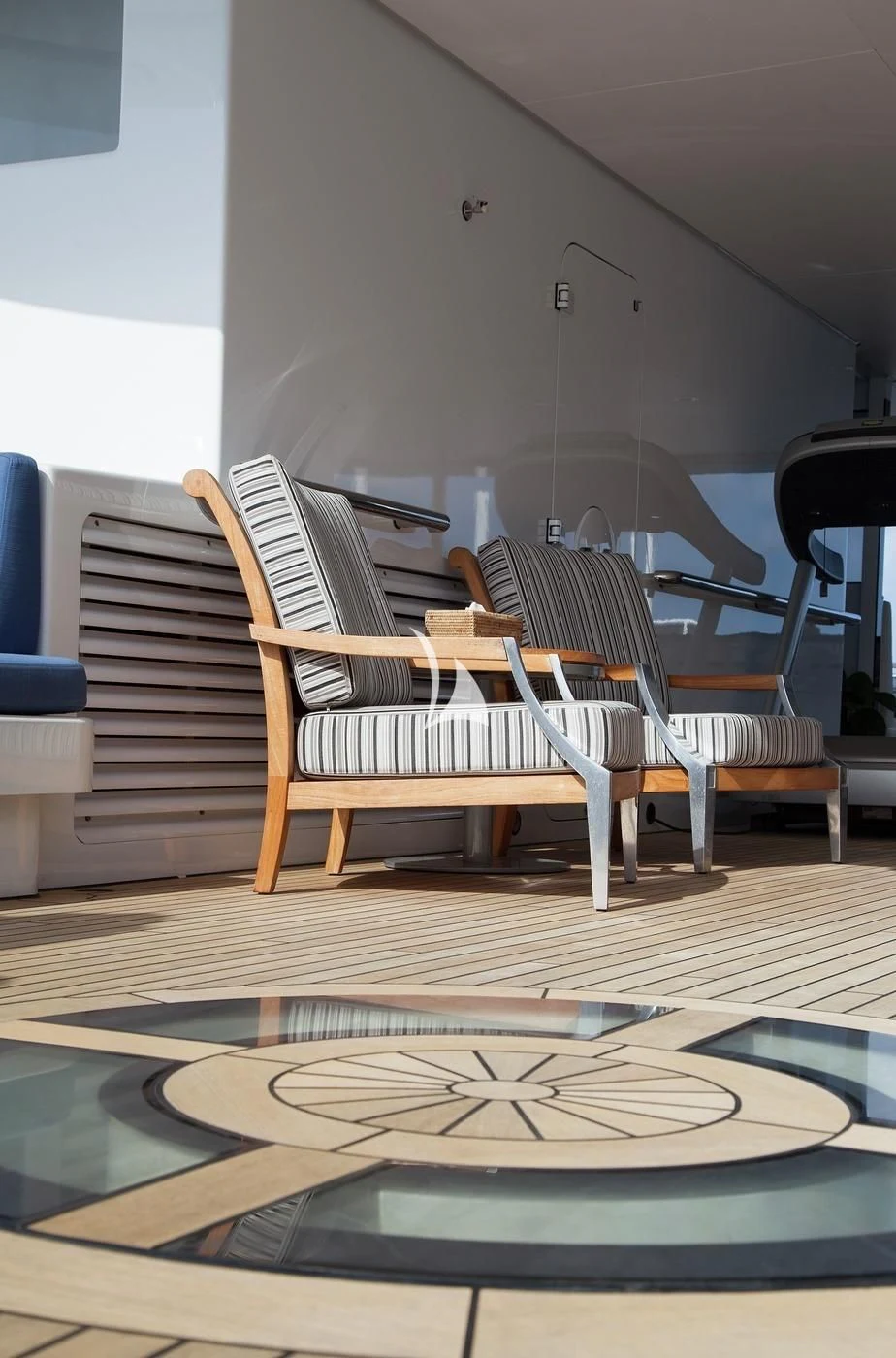 a room with chairs and a rug aboard SCOTT FREE Yacht for Charter
