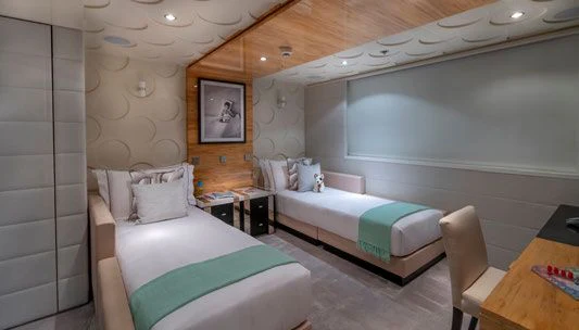 a room with two beds aboard SCOTT FREE Yacht for Charter