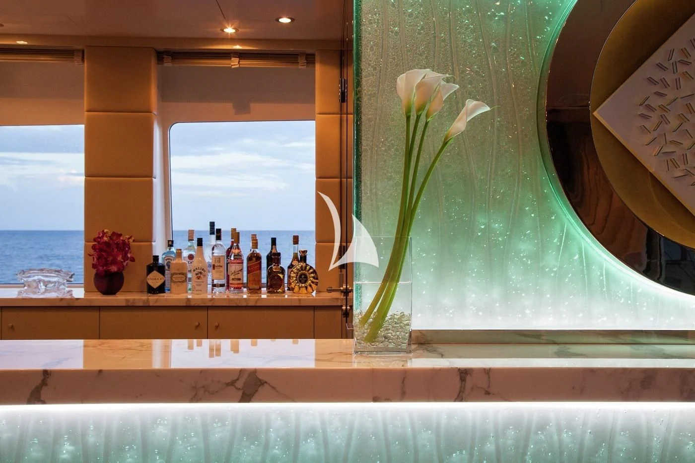 a vase of flowers sits on a counter top aboard SCOTT FREE Yacht for Charter
