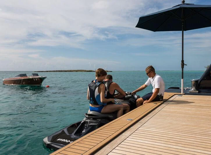 a group of people on a boat aboard SCOTT FREE Yacht for Charter