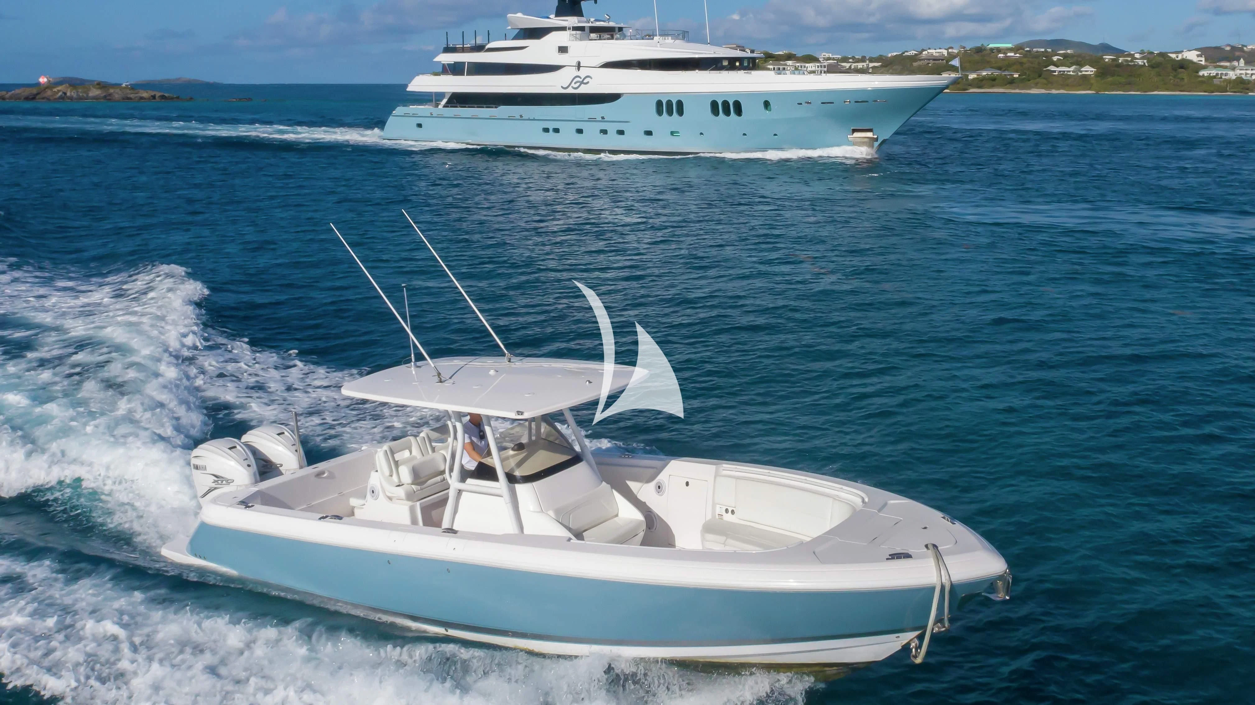 a couple of boats on the water aboard SCOTT FREE Yacht for Charter