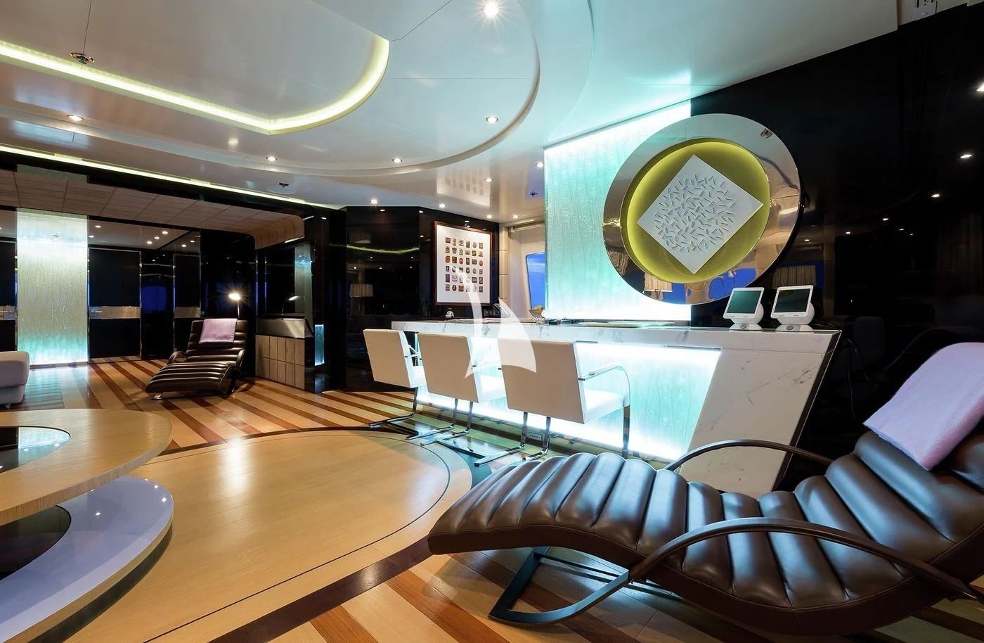 a room with chairs and a table aboard SCOTT FREE Yacht for Charter