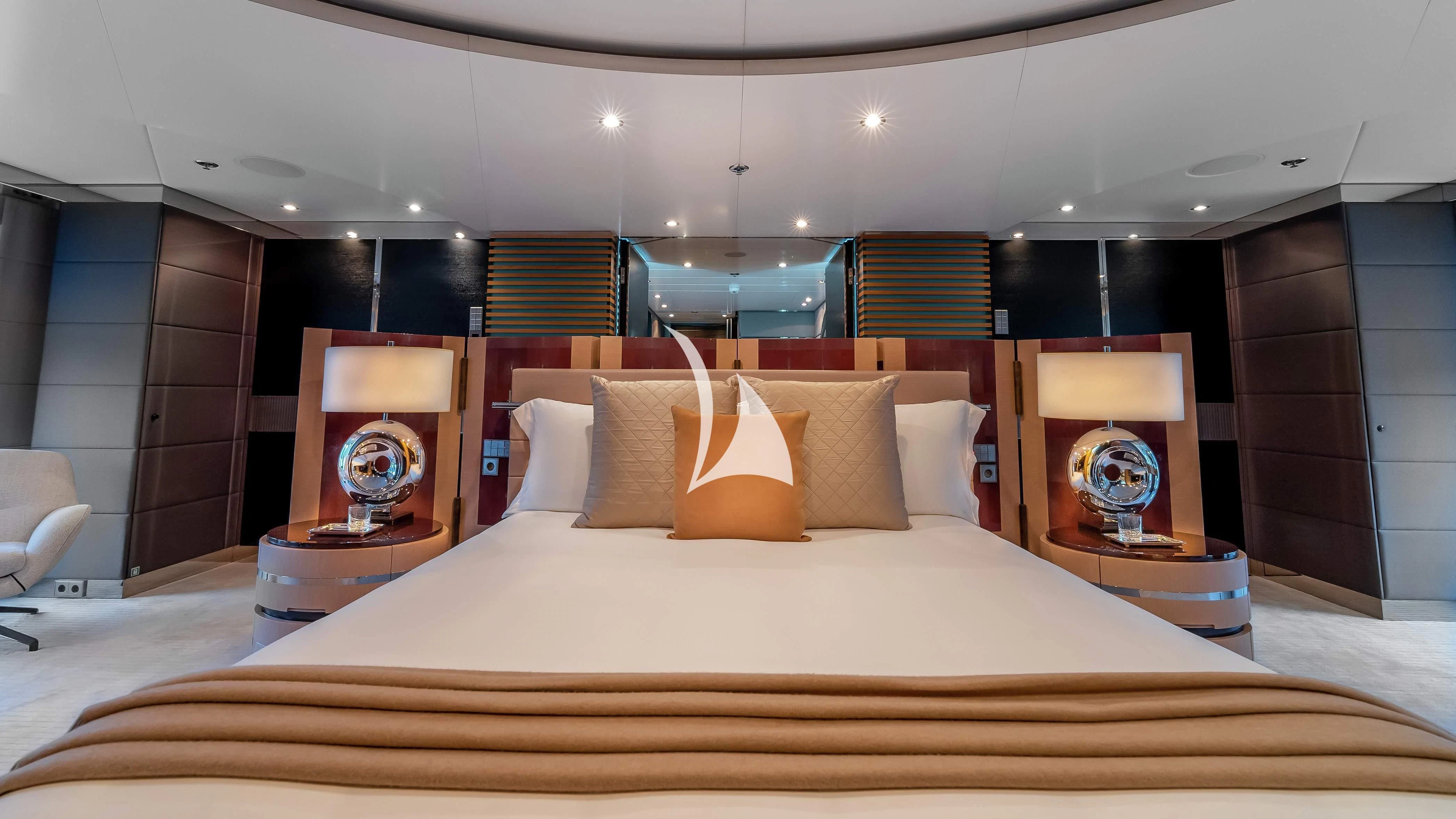 a bed with pillows and pillows aboard SCOTT FREE Yacht for Charter