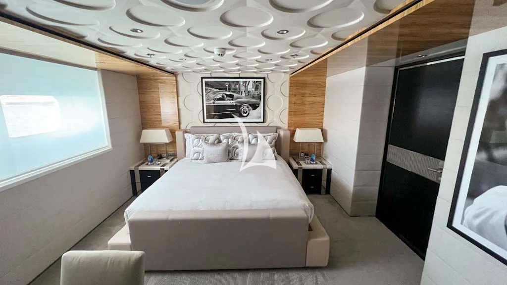 a bedroom with a large bed aboard SCOTT FREE Yacht for Charter