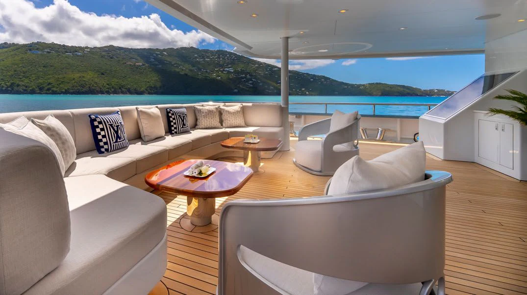 a living room with a large patio aboard SCOTT FREE Yacht for Charter