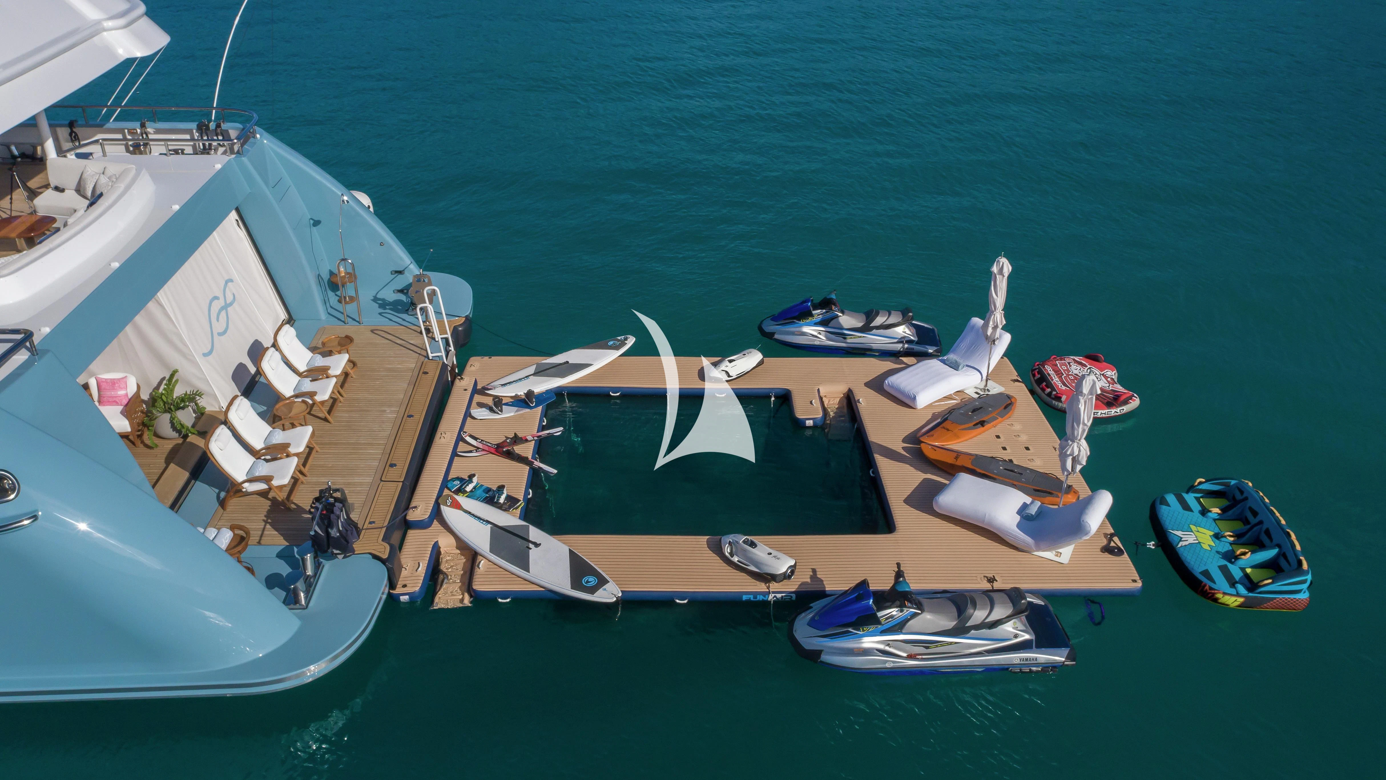a group of boats on the water aboard SCOTT FREE Yacht for Charter