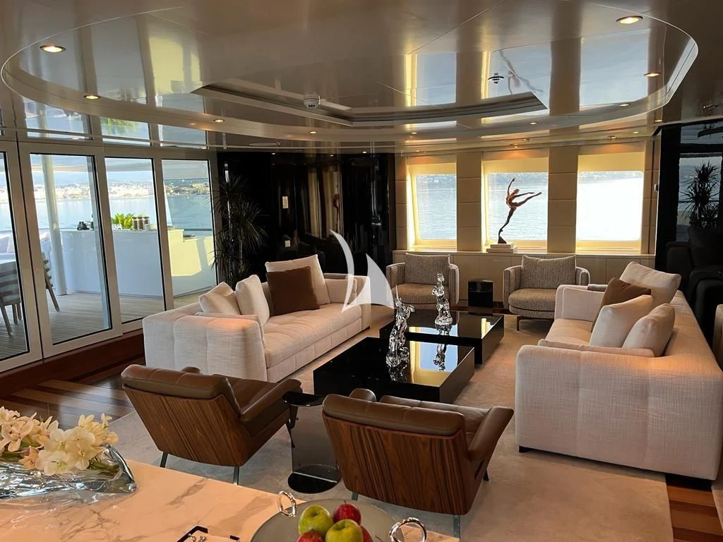 a living room with a large window aboard SCOTT FREE Yacht for Charter