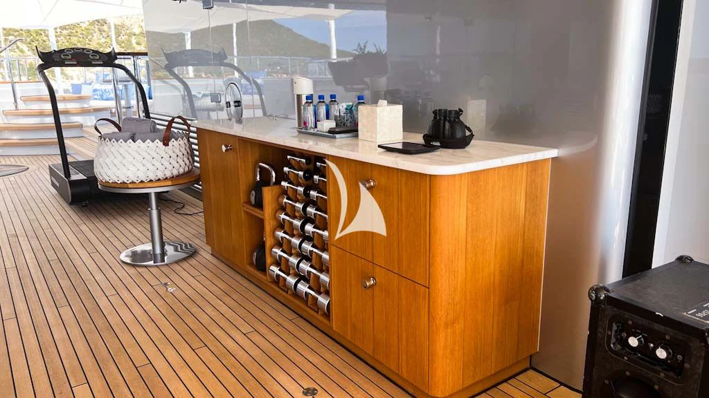 a kitchen with a wood floor aboard SCOTT FREE Yacht for Charter