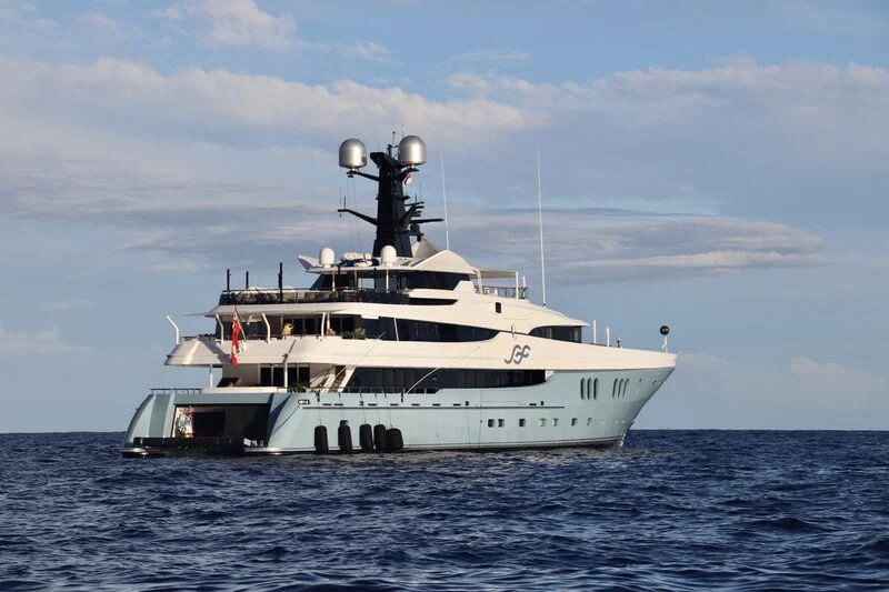 a large white boat in the water aboard SCOTT FREE Yacht for Charter