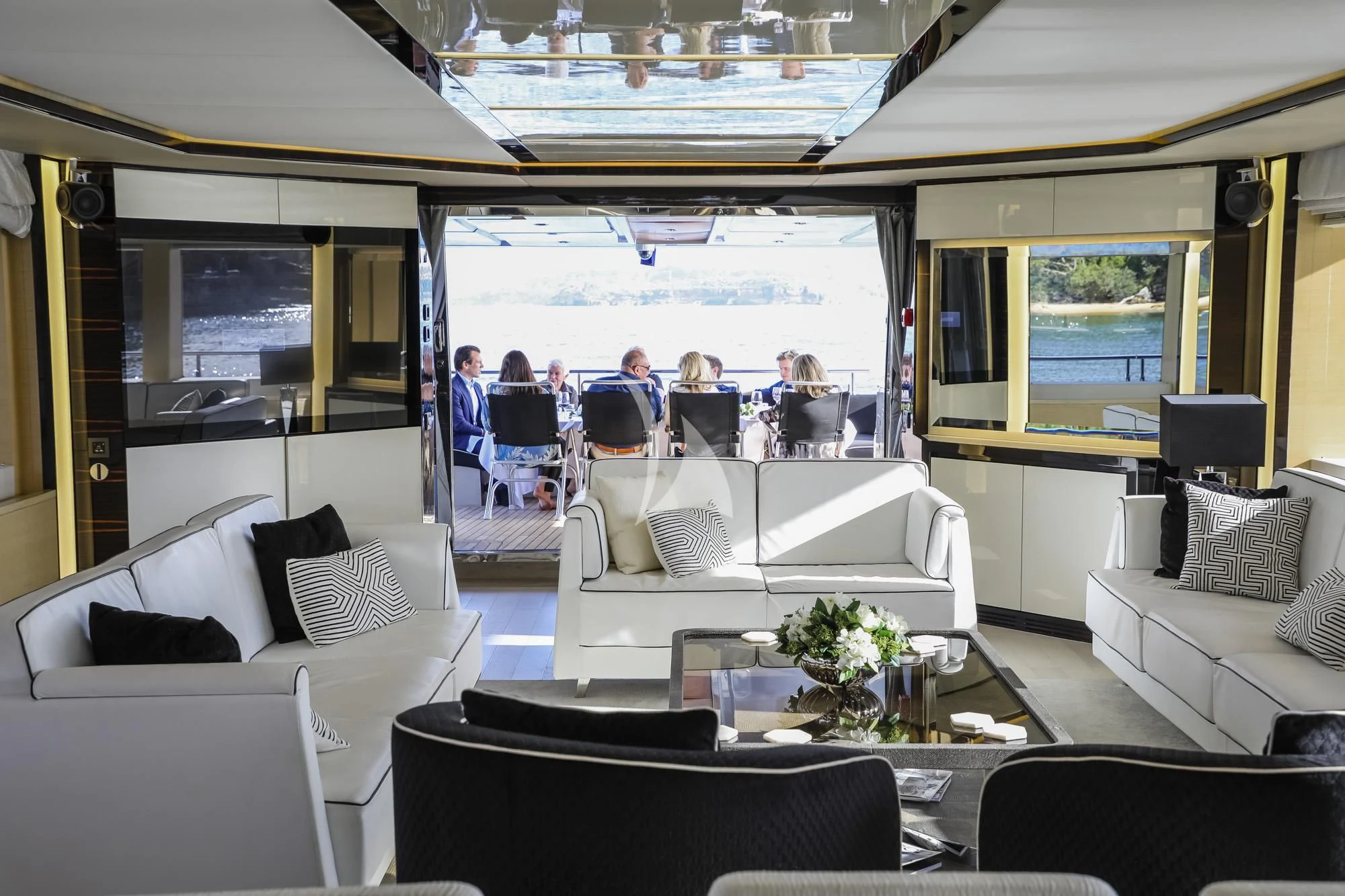 a group of people on a boat aboard GHOST II Yacht for Sale