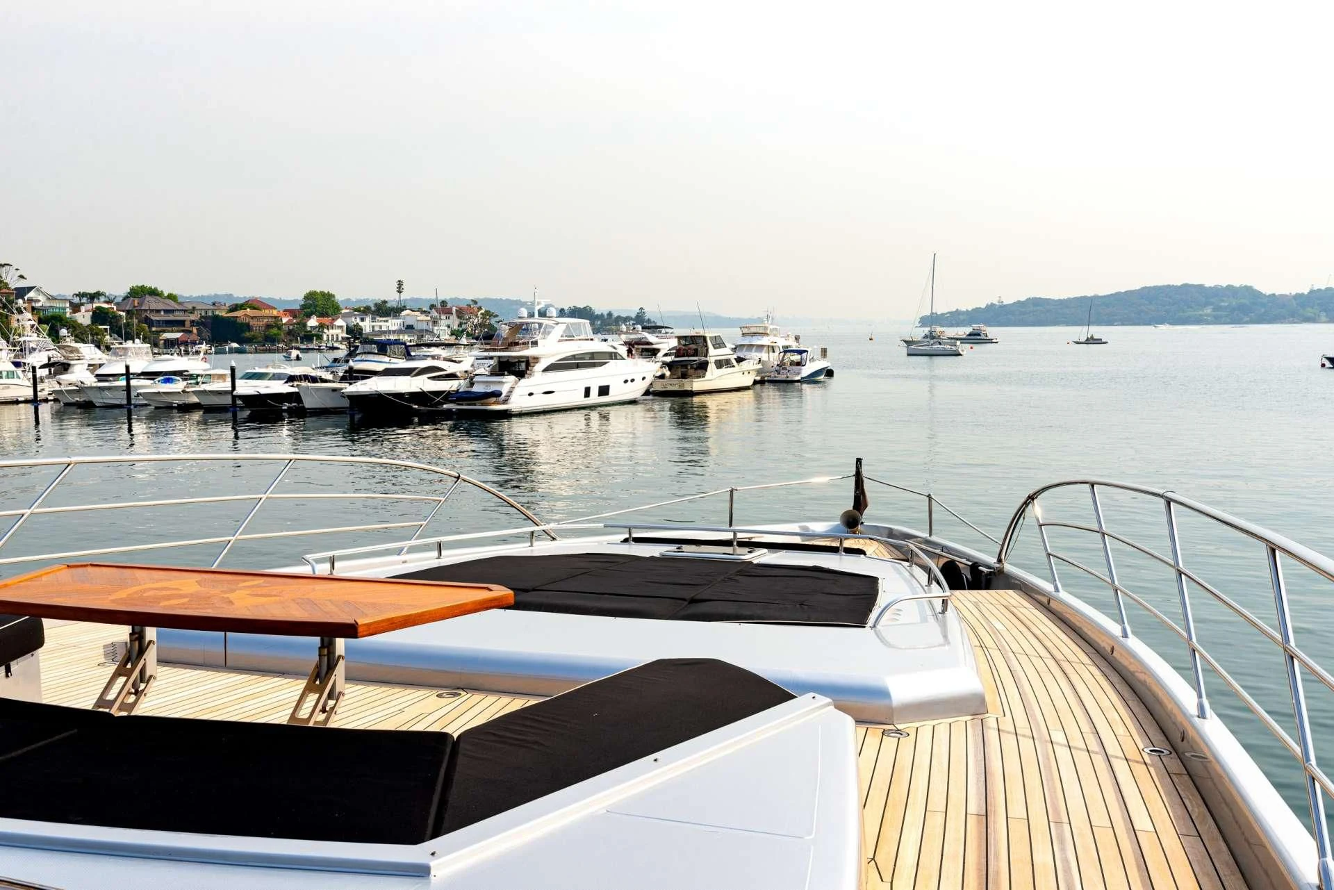 a boat is parked on the water aboard GHOST II Yacht for Sale