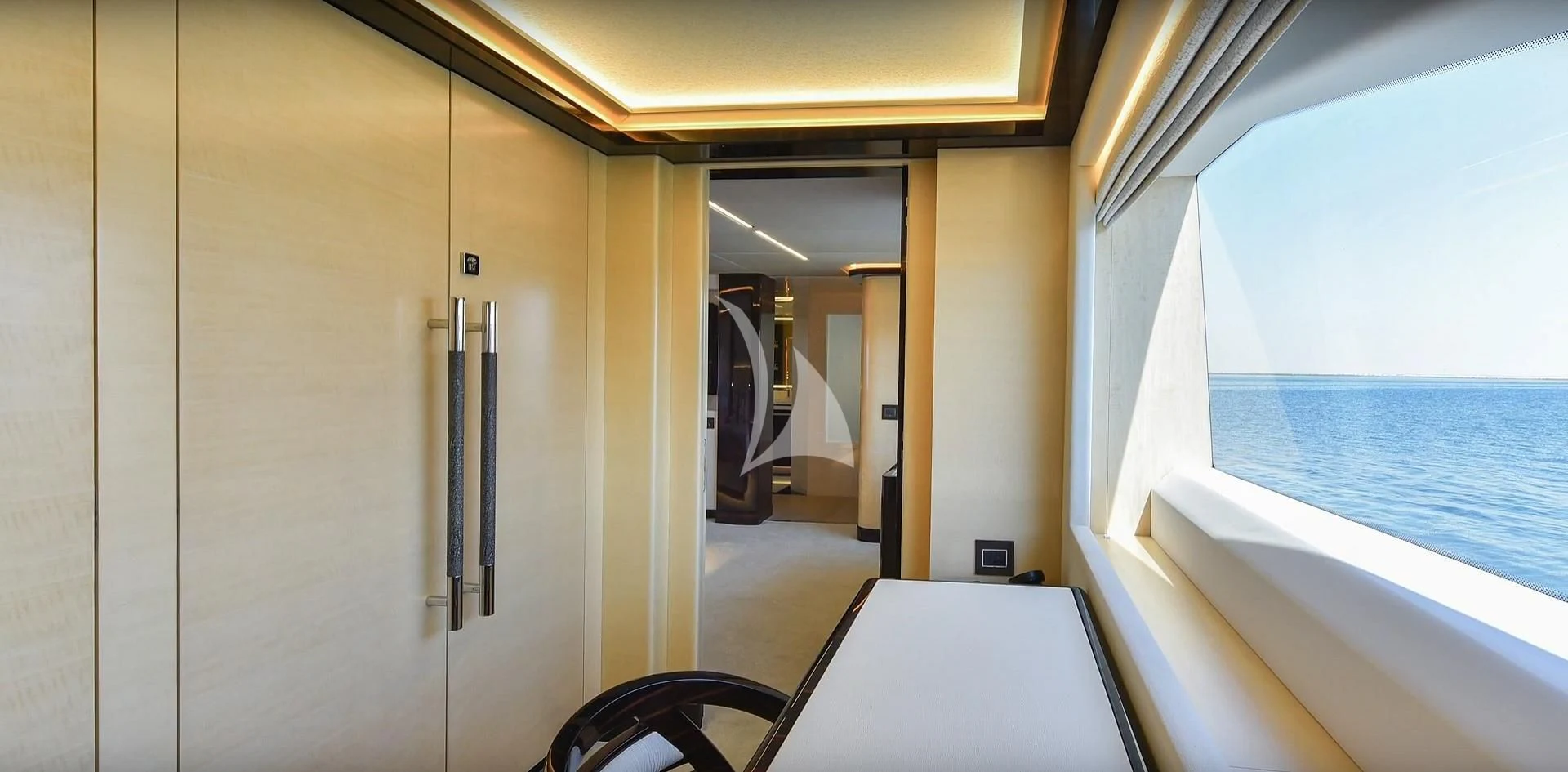 a room with a door and a window aboard GHOST II Yacht for Sale