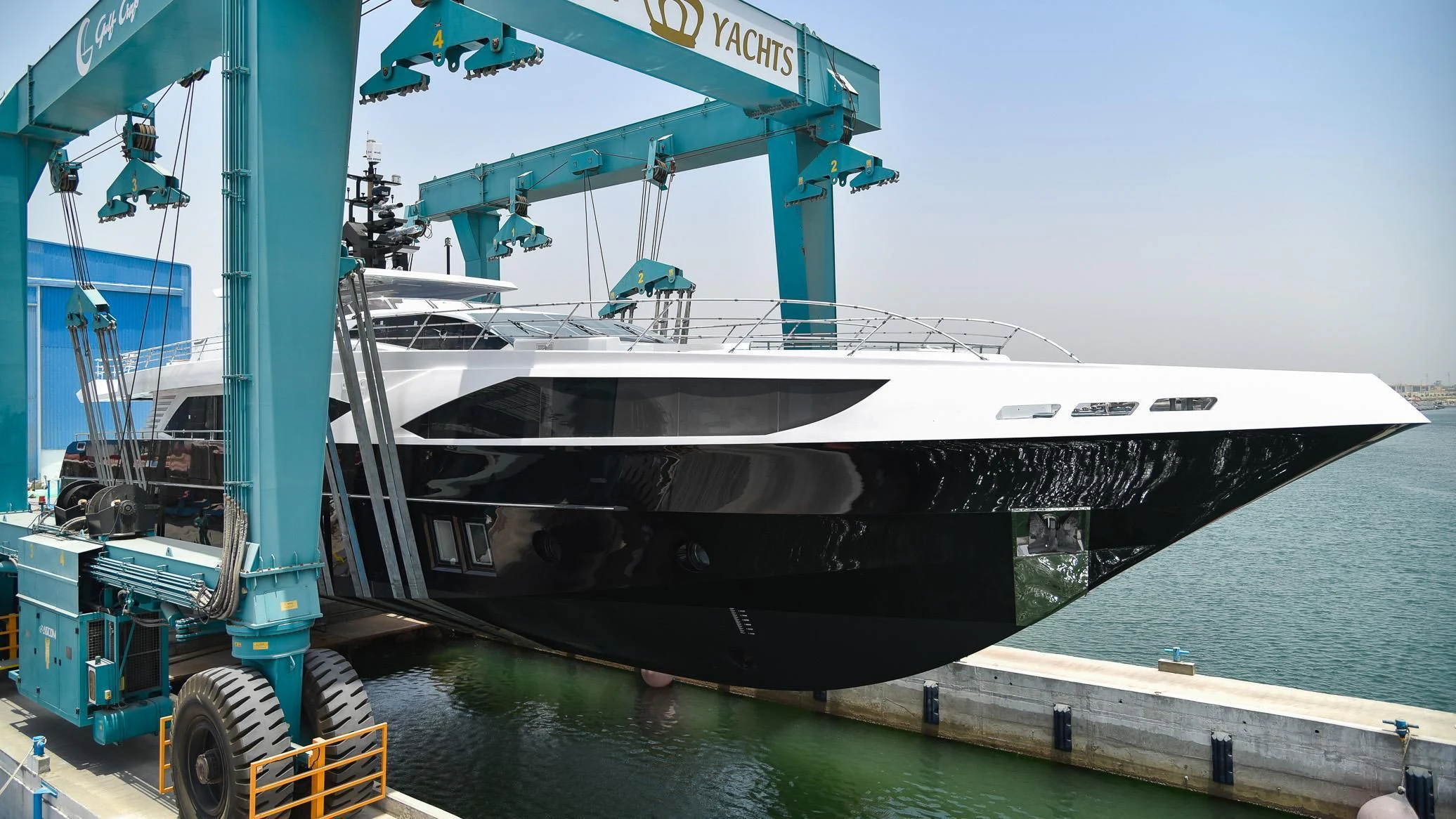 a large boat on a dock aboard GHOST II Yacht for Sale