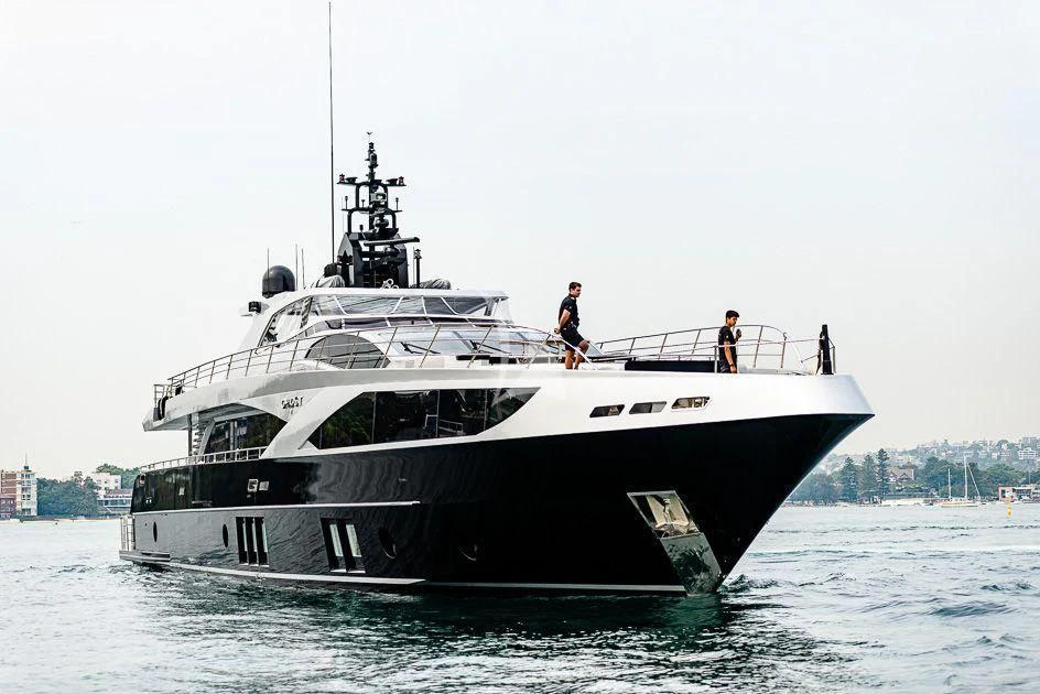 a couple of people on a boat aboard GHOST II Yacht for Sale