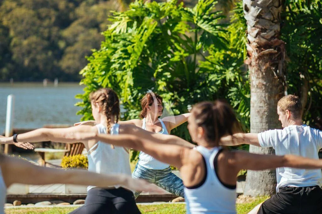a group of people on a dock aboard GHOST II Yacht for Sale