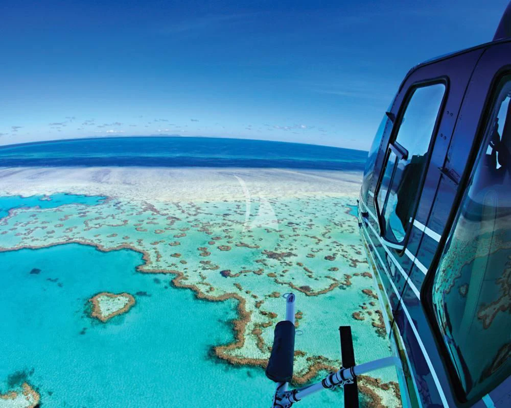 a car on a road aboard GHOST II Yacht for Sale