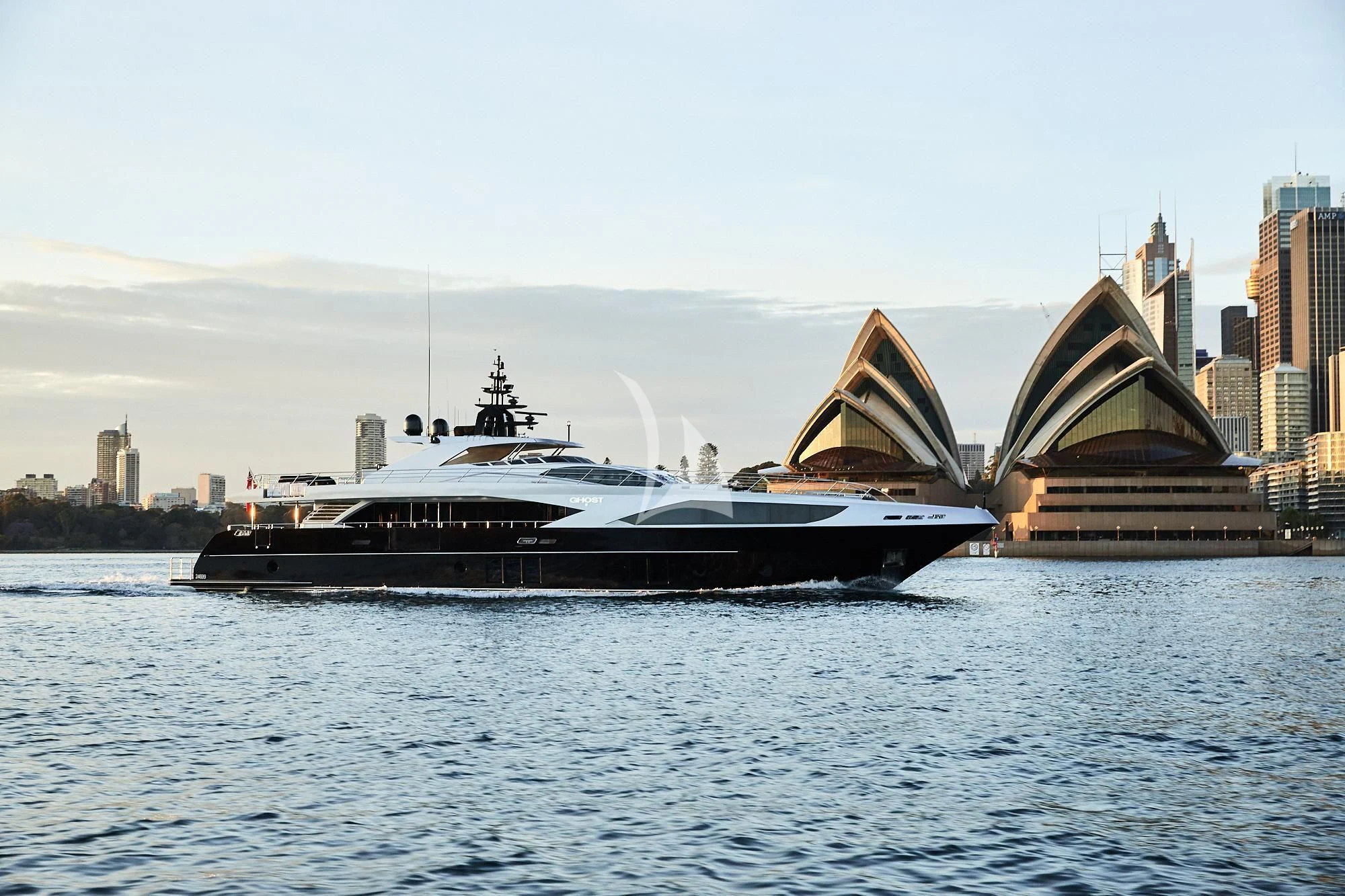 a large boat in the water aboard GHOST II Yacht for Sale