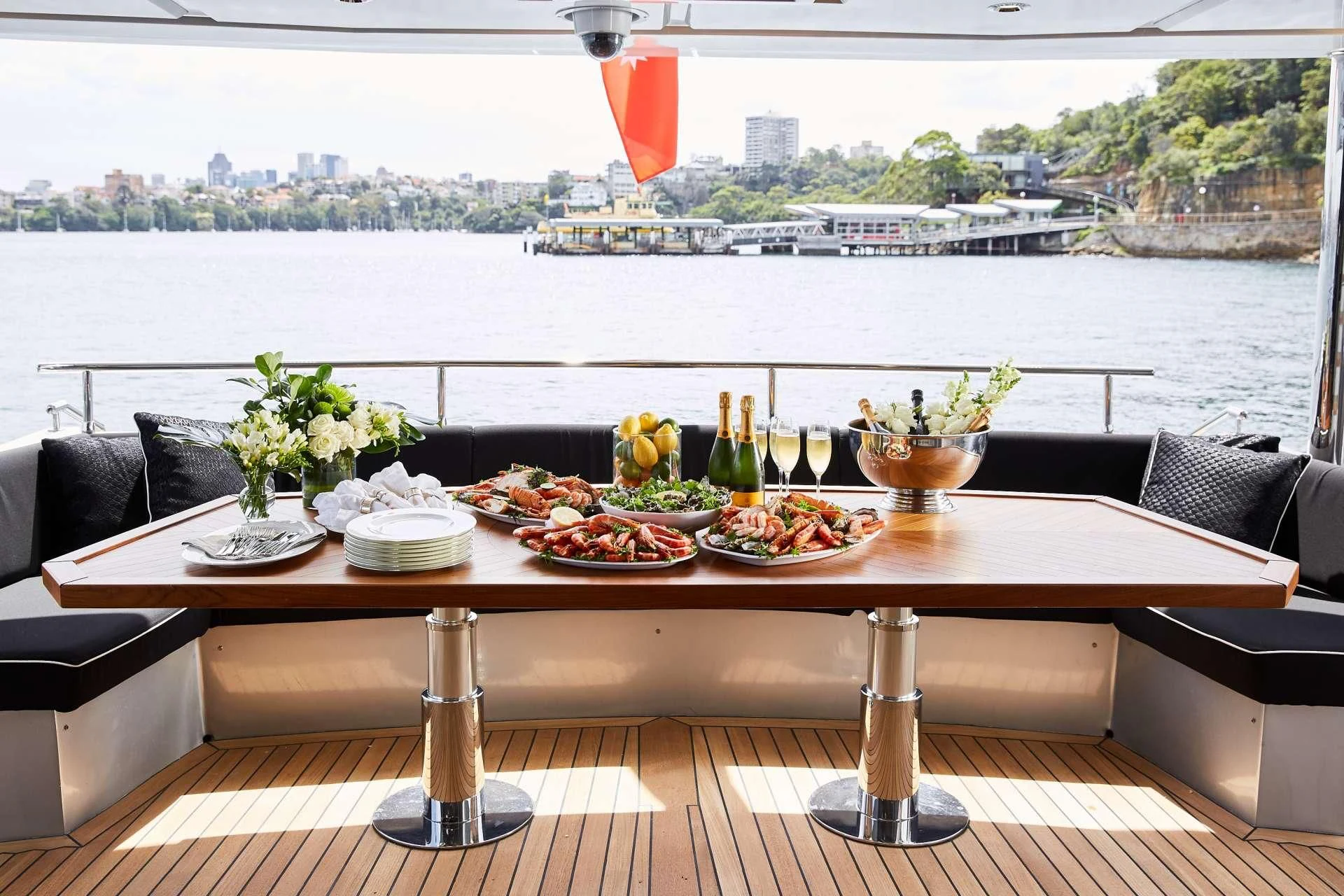 a table with food on it aboard GHOST II Yacht for Sale