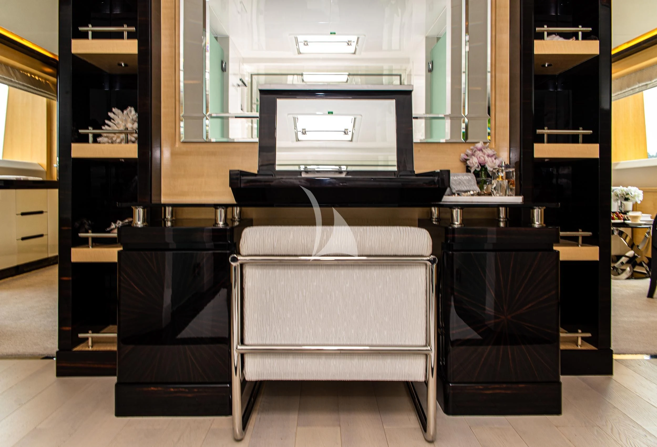 a room with a chair and a tv aboard GHOST II Yacht for Sale