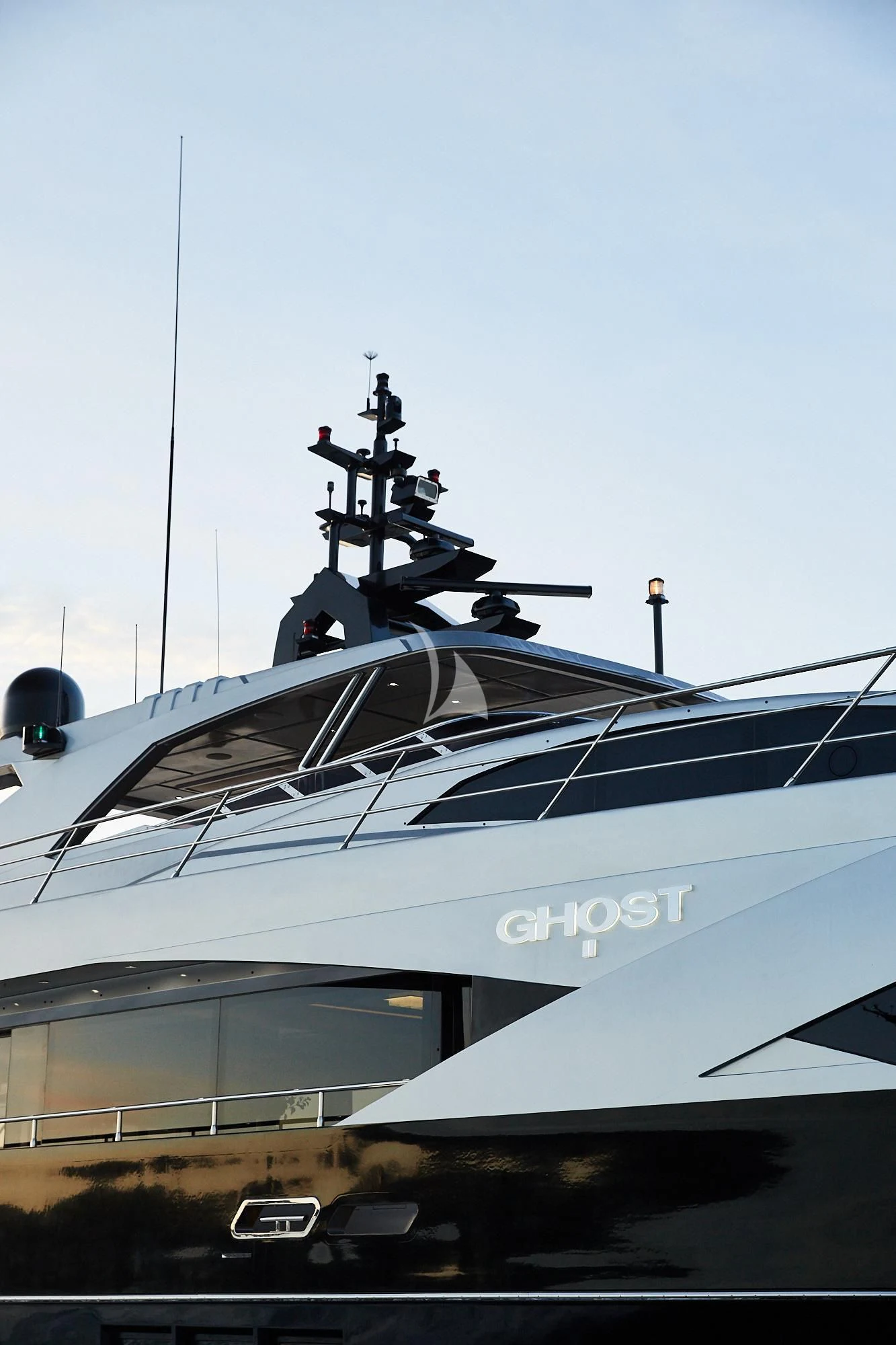 a large white ship aboard GHOST II Yacht for Sale