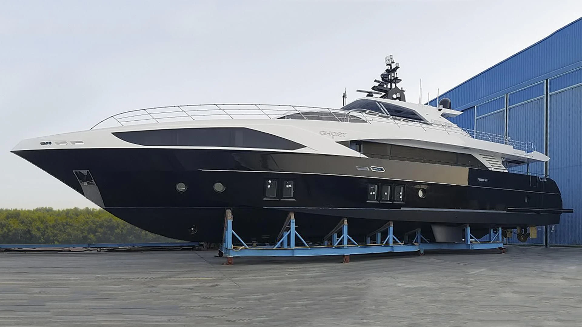 a large ship docked aboard GHOST II Yacht for Sale