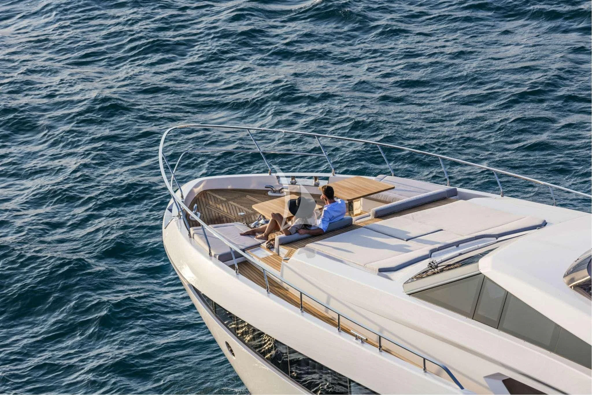 a group of people in a boat aboard PIOLA Yacht for Sale