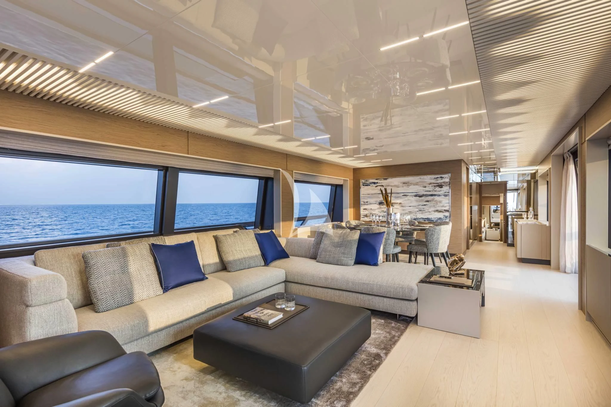a living room with a large window aboard PIOLA Yacht for Sale