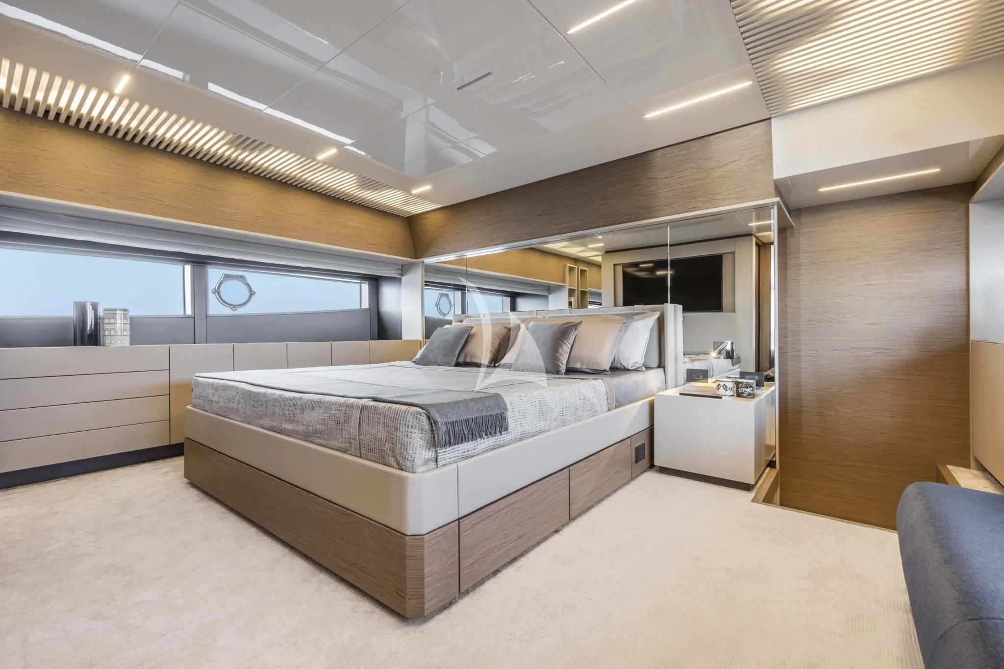 a large bed in a room aboard PIOLA Yacht for Sale