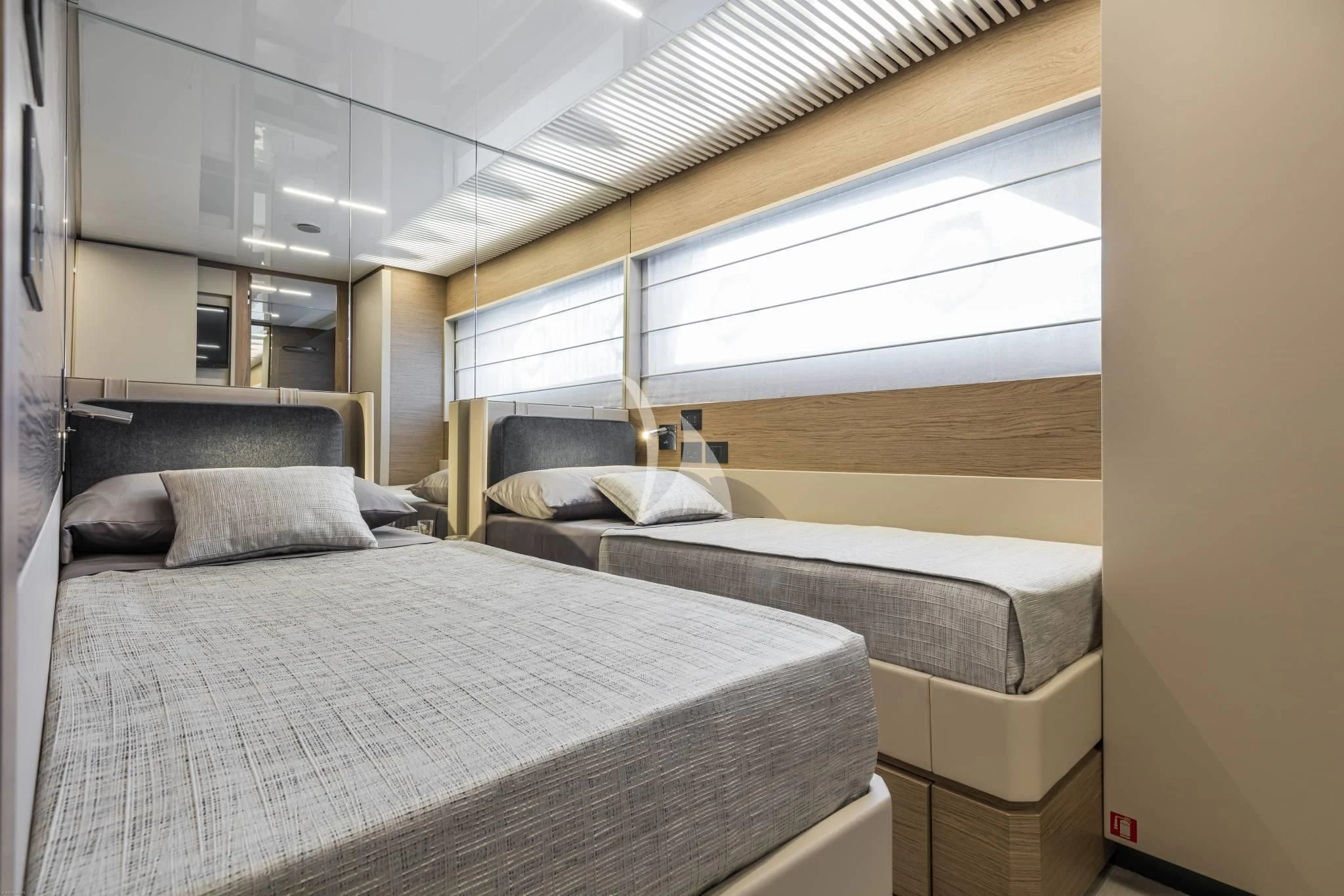 a room with two beds aboard PIOLA Yacht for Sale