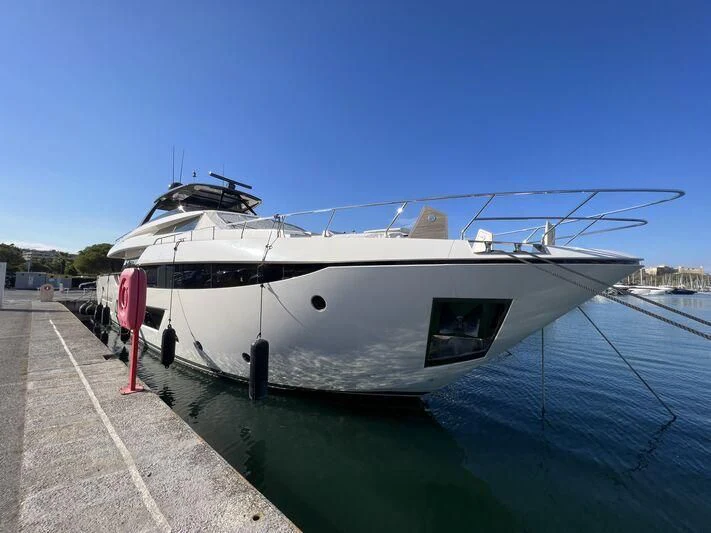 a boat docked at a pier aboard PIOLA Yacht for Sale