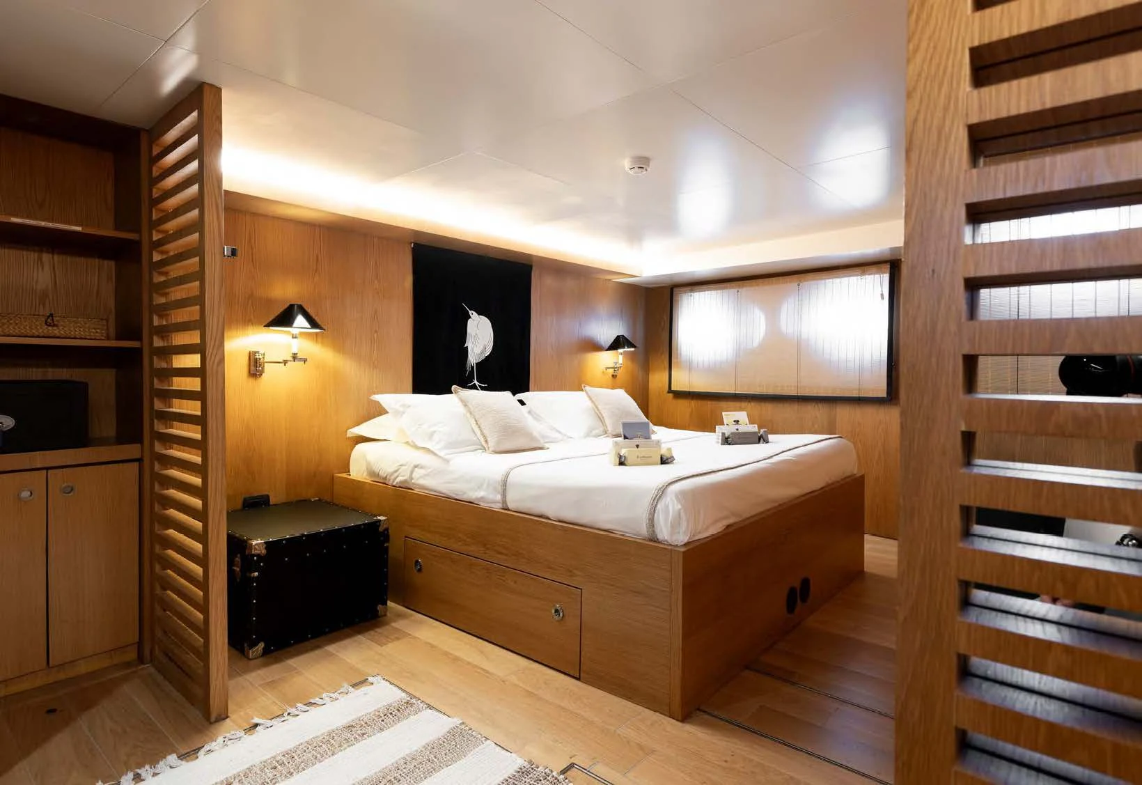 a bedroom with a large bed aboard SOUNION II Yacht for Sale