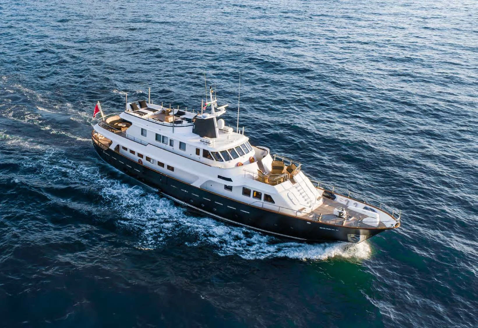 a large ship in the water aboard SOUNION II Yacht for Sale