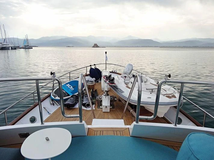 a boat is parked on the water aboard SOUNION II Yacht for Sale