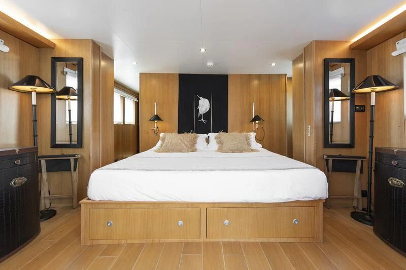 a large bed in a room aboard SOUNION II Yacht for Sale