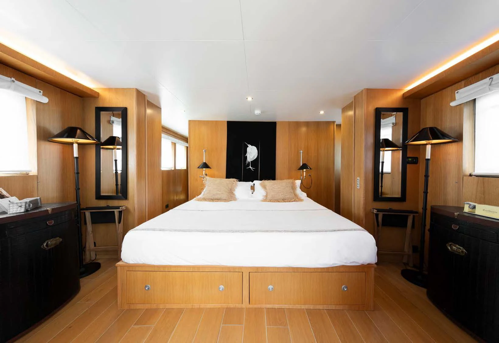 a large bed in a hotel room aboard SOUNION II Yacht for Sale