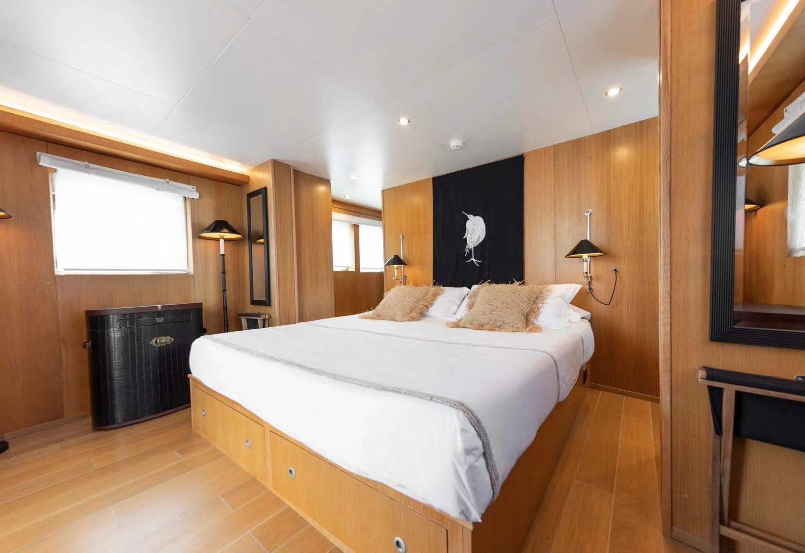 a bedroom with a large bed aboard SOUNION II Yacht for Sale