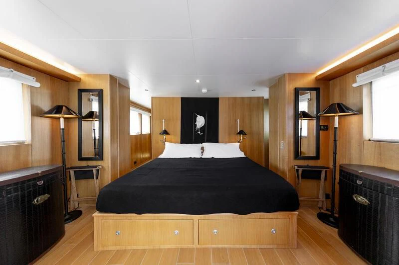a large bed in a room aboard SOUNION II Yacht for Sale