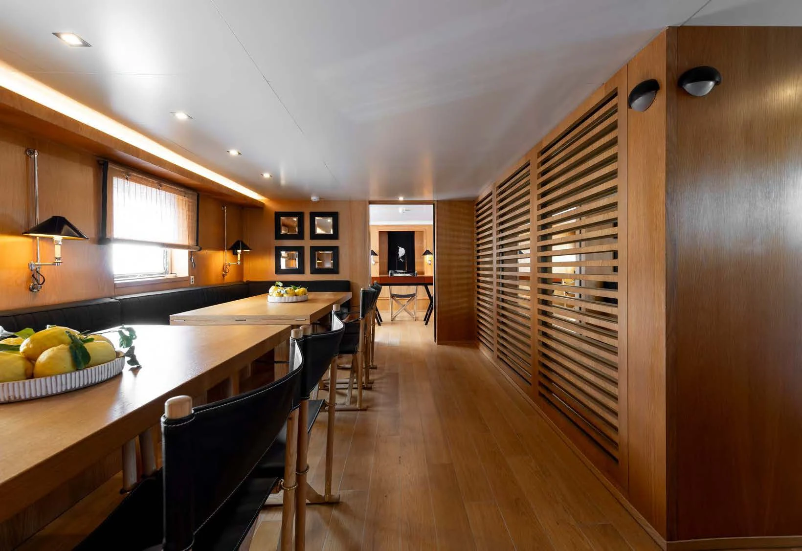 a kitchen with a wood floor aboard SOUNION II Yacht for Sale