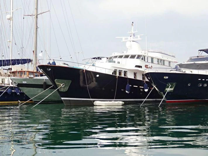 a few boats are parked in the water aboard SOUNION II Yacht for Sale