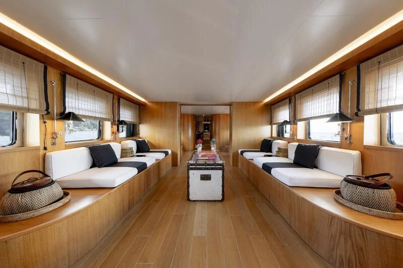 a room with a bed and a couch aboard SOUNION II Yacht for Sale