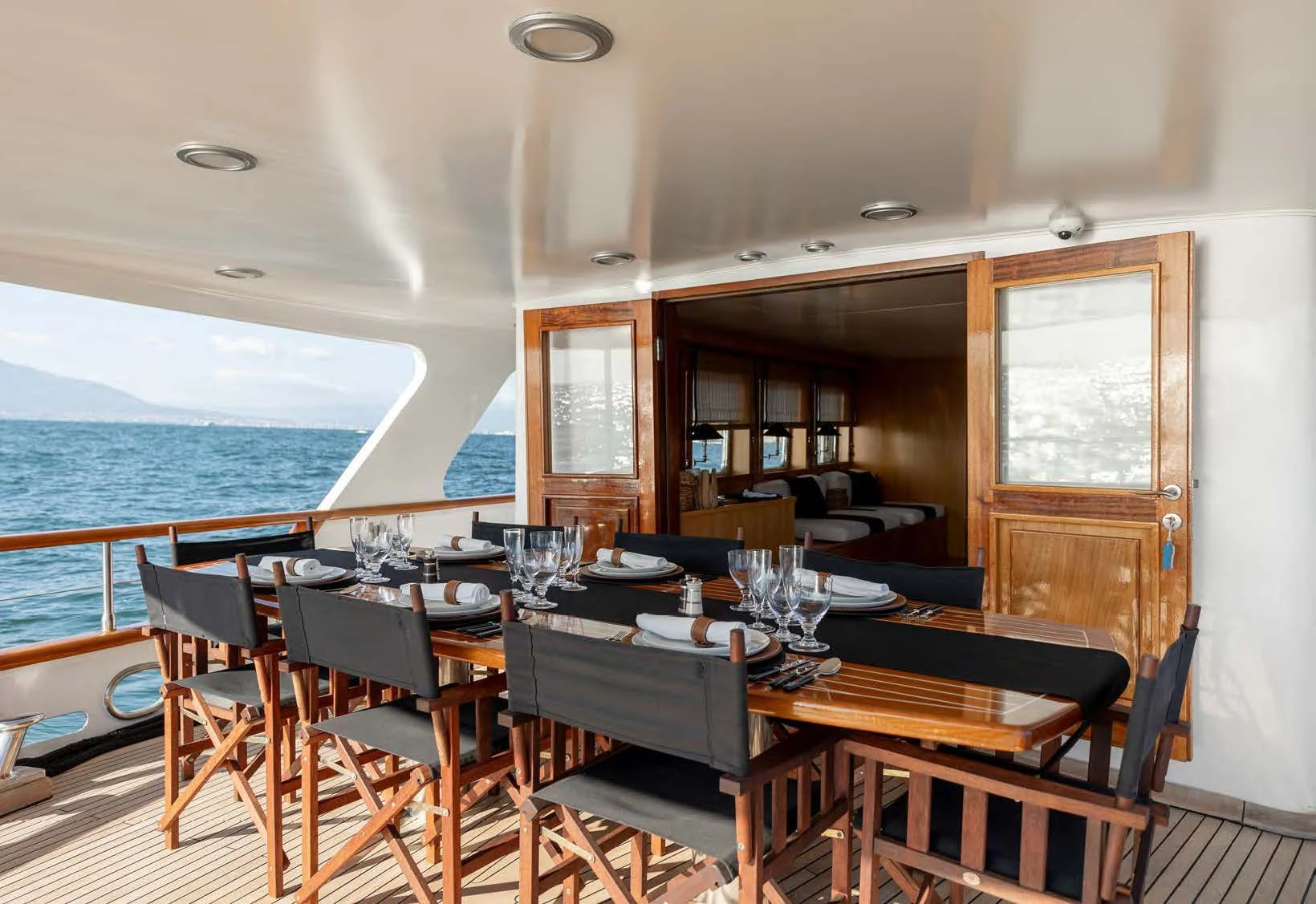 a dining table on a boat aboard SOUNION II Yacht for Sale