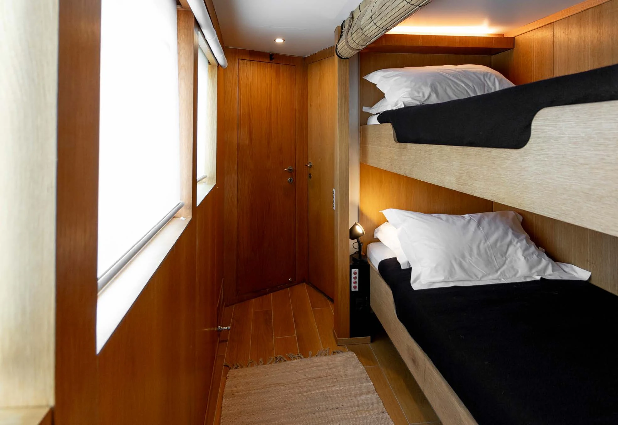a room with two beds aboard SOUNION II Yacht for Sale