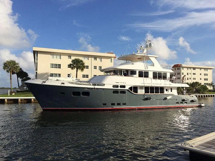 a large white boat on the water aboard MACGUFFIN Yacht for Sale