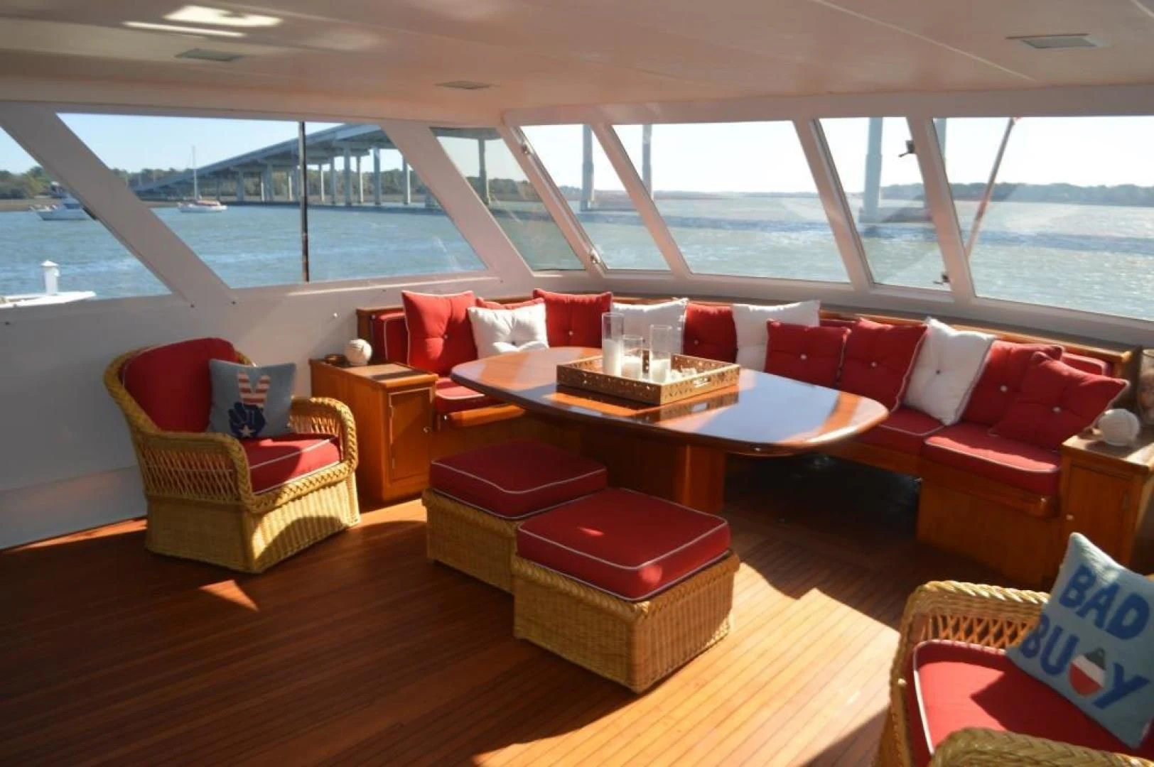 a living room with a large window aboard ENCORE V Yacht for Sale