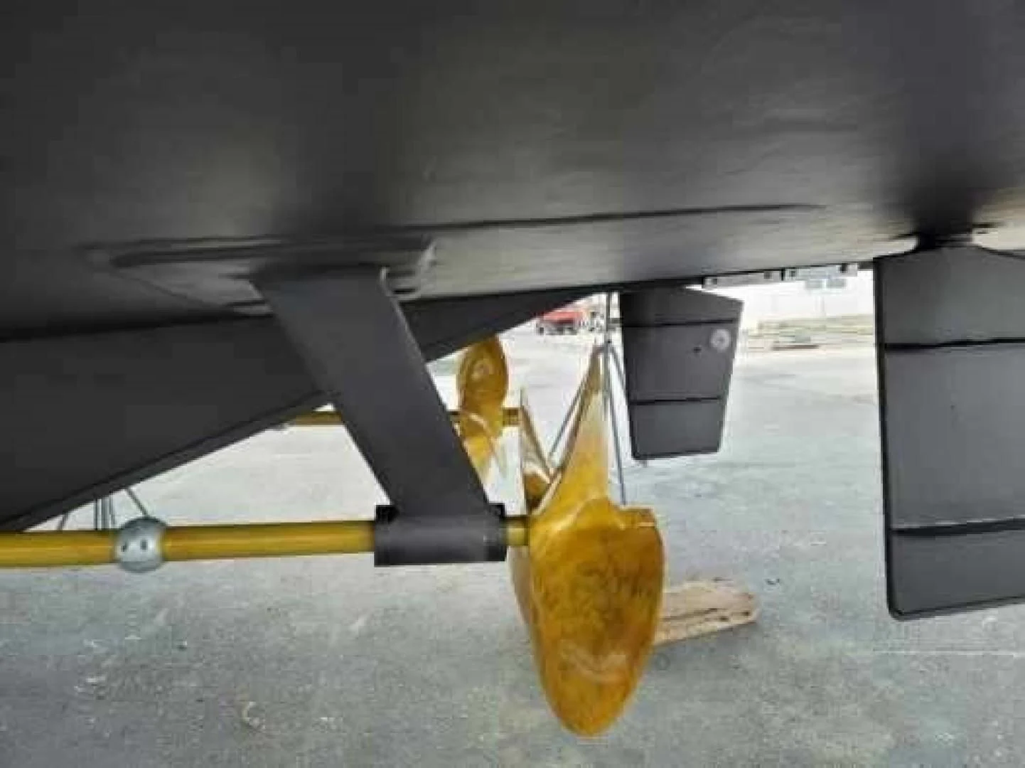 a fire extinguisher under a car aboard ENCORE V Yacht for Sale